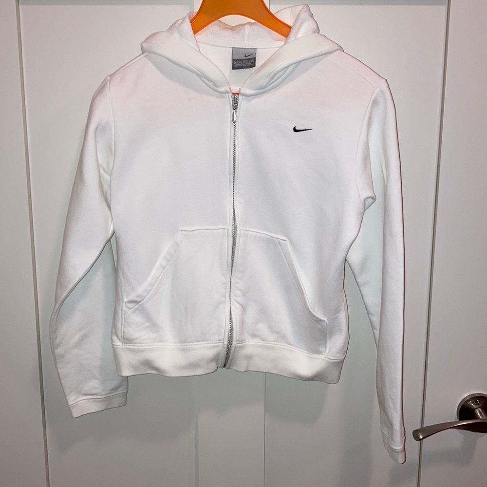 Women’s white Nike sports jacket.